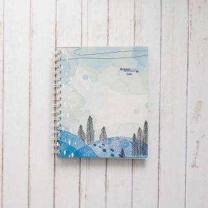 CUADERNO MEDIO OFICIO LINEAS, DISEÑO BOSQUE AZUL